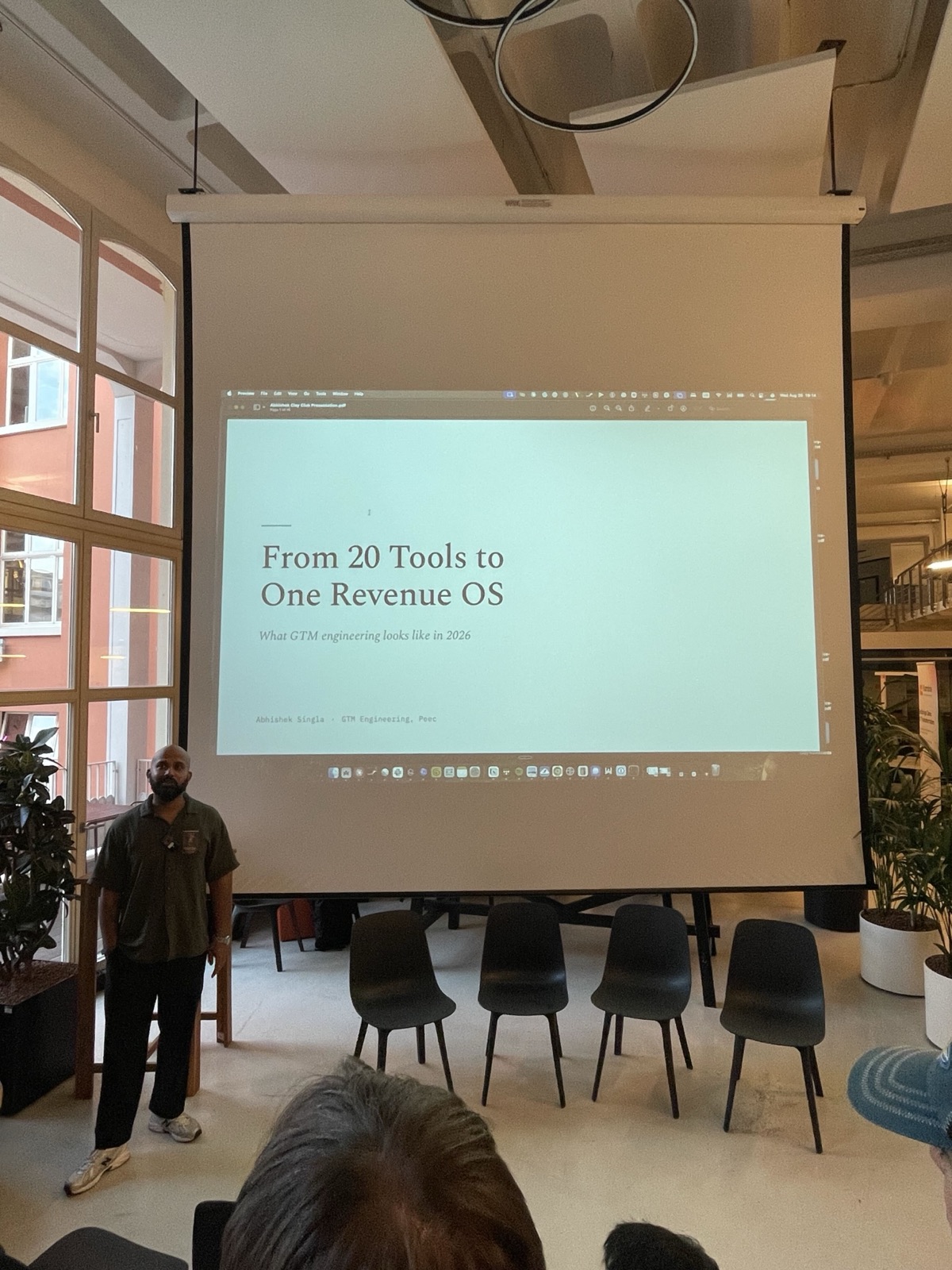 The title slide of the talk, From 20 Tools to One Revenue OS